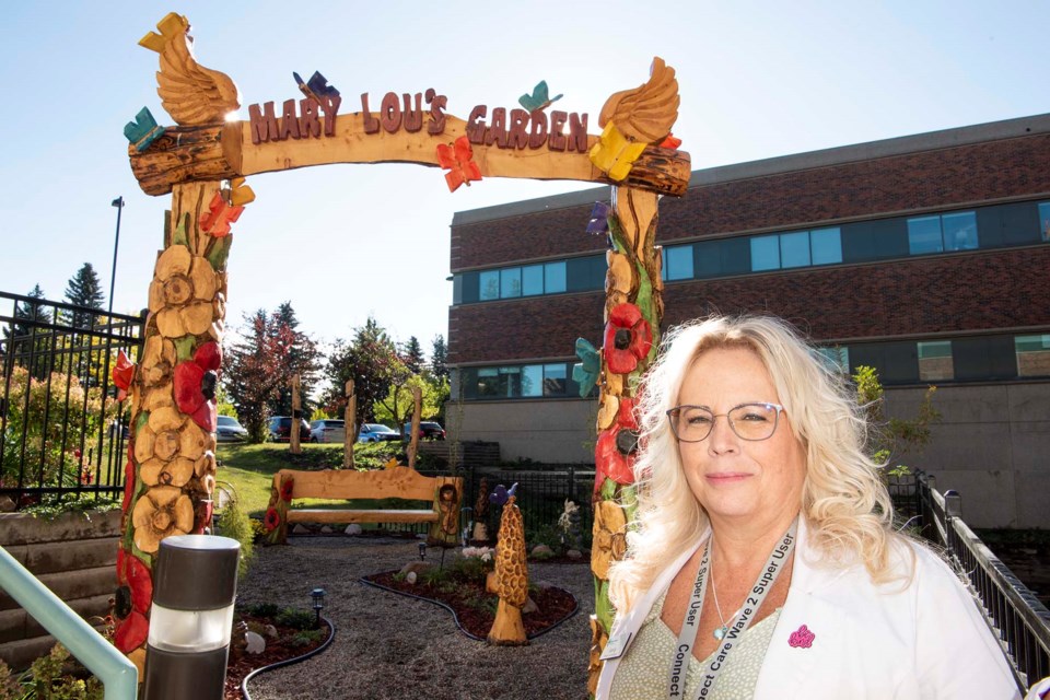 MAGICAL PLACE — Sturgeon Community Hospital garden club lead Sandy Mageau (shown) and a team of volunteers have built this healing garden on the hospital’s grounds over the last two years. The garden is dedicated to former site director Mary Lou McKenzie, who died in 2022. KEVIN MA/St. Albert Gazette