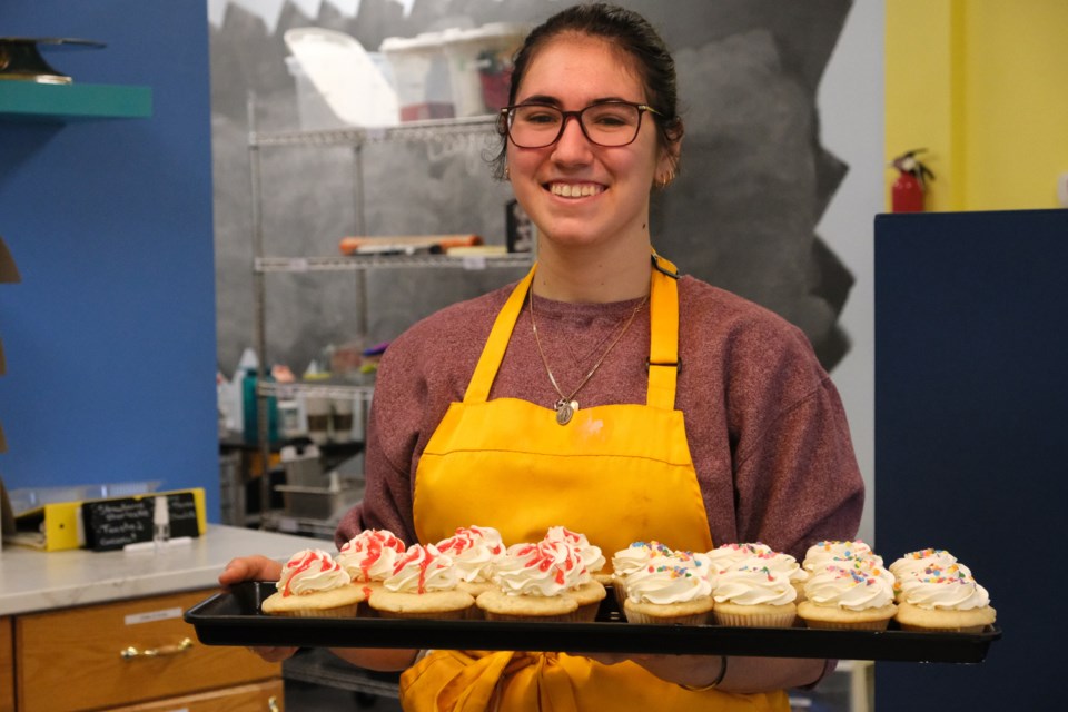 Amanda O'Donnell shows off a tray of cupcakes at The Celiac Baker, St. Albert's first completely gluten-free bakery. RILEY TJOSVOLD/St. Albert Gazette