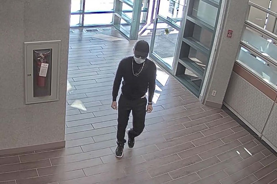 ROBBERY SUSPECT — St. Albert RCMP are asking for the public's help in identifying this man in connection with a theft of a Rolex watch at the TD Canada Trust bank on July 14. RCMP/Photo