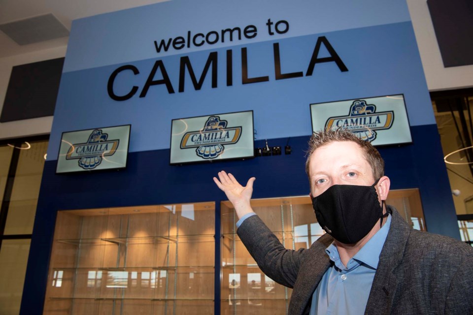 DOOR'S OPEN — Camilla School principal Dan Stephen practices welcoming his students to their new school building on March 18, 2021. The new Camilla School officially opens April 6, 2021. KEVIN MA/St. Albert Gazette