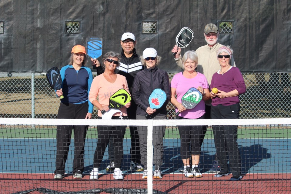 Local club members hit the courts at 9 a.m. sharp on Tuesday. From left to right: Laura McDonnell, Suzanne Wiebe, Tim Kwok, Joan Hamaliuk, Teresa Hotchkiss, Dan Stoker, and Karen Mercier. JACK FARRELL/St. Albert Gazette
