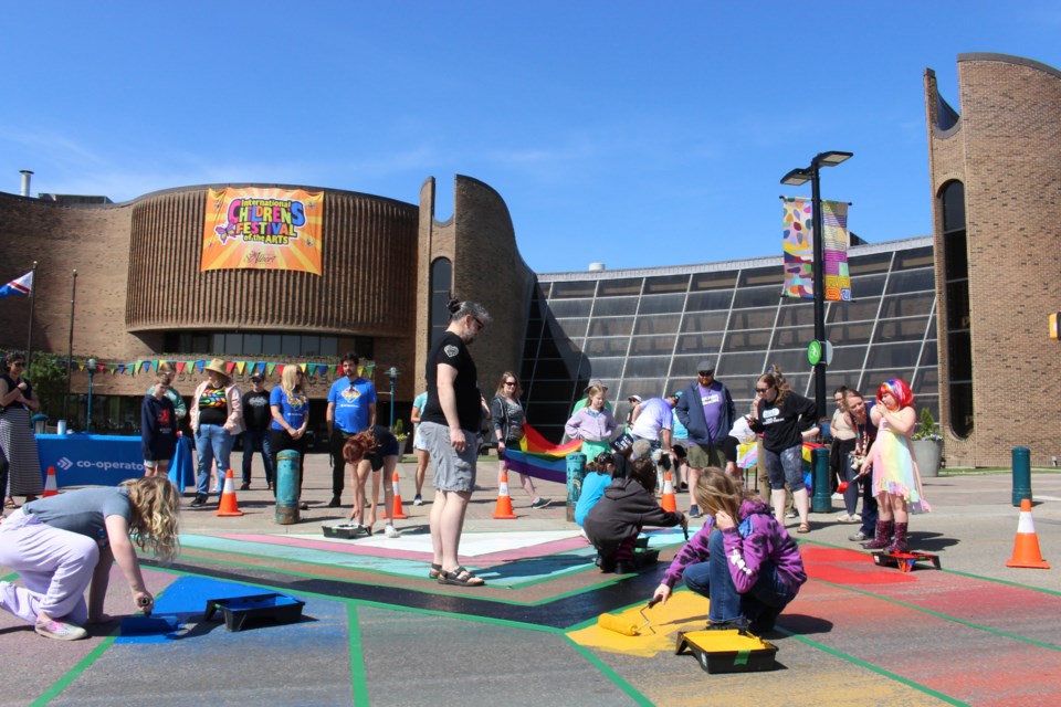 Councillors, sponsor organizations, and families gathered at St. Albert Place on May 25 to help paint the Pride crosswalk. It was the first year the event was held without the Outloud St. Albert group.