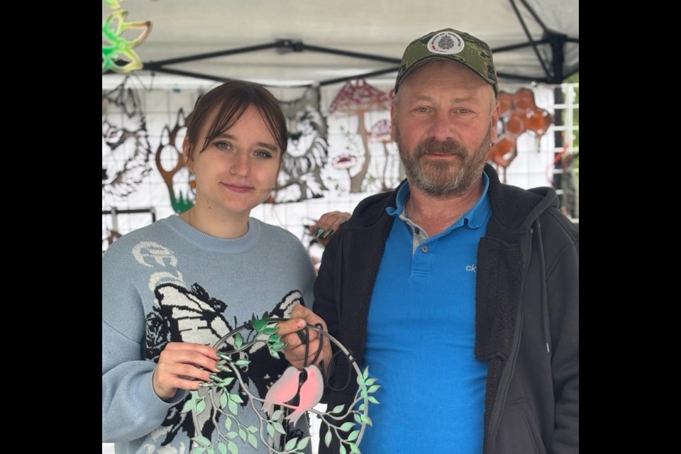 Katerina and Vladyslav Ivanchenko operate Nata's Home Decor, a family business promoting metal art. It is one of 250 vendors at St. Albert Farmers Market. 