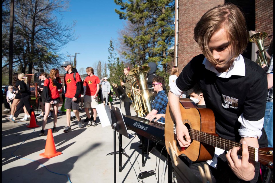 OPENING JAM — Bellerose Grade 11 student Filip Trela and bandmates play the 12th Street Rag to welcome participants in the 19th annual Bellerose Bikeathon May 26, 2022. Many participants were in film-related costumes as per the event's Hollywood theme. KEVIN MA/St. Albert Gazette