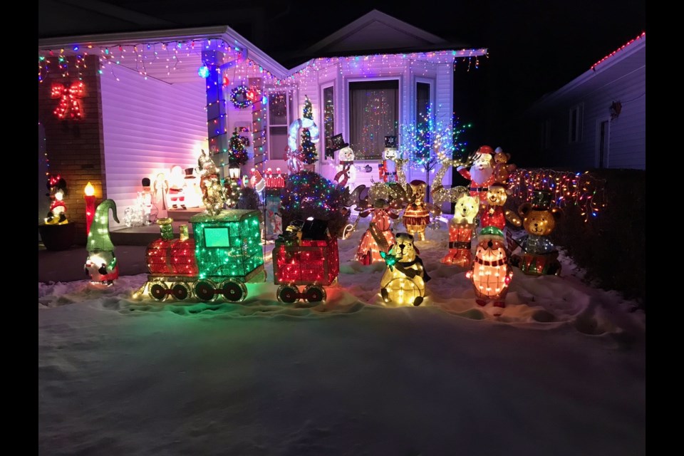 Norm Pethicks house on 39 Dean Crescent is woodland fantasy. He is second-place winner in the Kinsmen's Light Up St. Albert contest, Most Festive New Home category. SUPPLIED