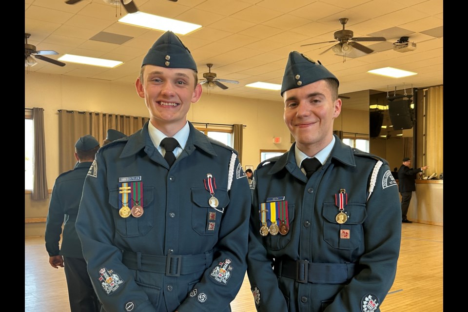 Air cadets Ryan Van Bostelen and Gabriel Keith after receiving the King Charles III Coronation Medal on Thursday night. 