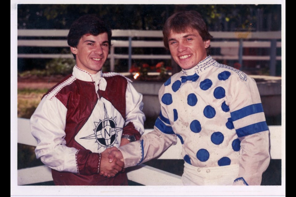 Roger Turcotte congratulates younger brother Ives, now a St. Albert resident, on a race well run in 1985. SUPPLIED