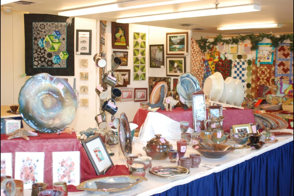 The  Country Craft Fair at St. Albert Place on Nov. 18 and 19 exhibits a variety of arts and crafts including quilts, paintings, pottery and glass wares. 