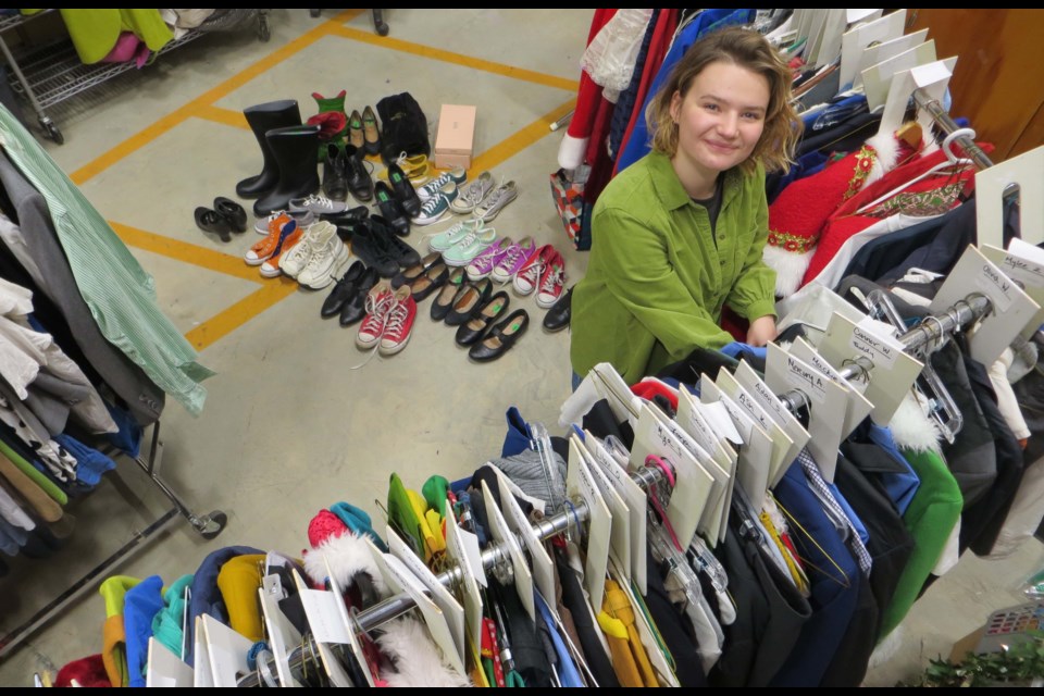 St. Albert Children's Theatre costume designer, Lieke den Bakker, adds last minute touches to racks of apparel to be used for the youth troupe's upcoming production. Elf, the Musical runs at the Arden Theatre from NOv. 23 to Dec. 3. 