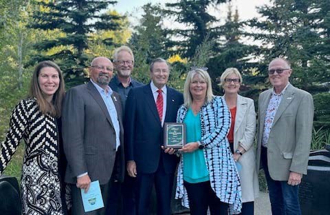 Dr. Alan Murdock (centre) received a Community Recognition Award on Thursday, Sept. 7 at the Community Recognition Garden. He was nominated for three-decades contributions supporting arts and culture. From left to right are Councillors Natalie Joly, Ken MacKay, Wes Broadhead, Mayor Cathy Heron, as well as councillors Shelley Biermanski and Mike Killick. SUPPLIED