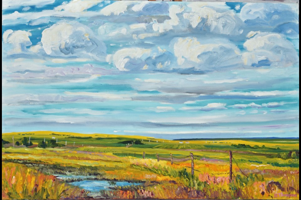 Bruce Thompson's  Prairie Puddle painted from a Lethrbidge scene is reminiscent of Alberta's big skies and vast prairie fields. BRUC THOMPSON 