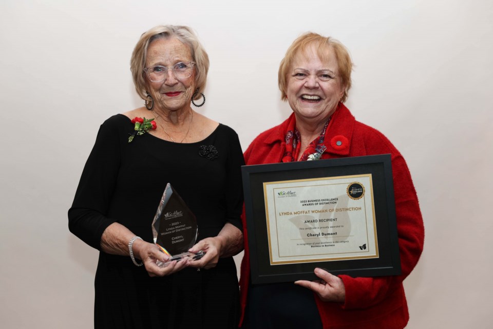 Cheryl Dumont poses with Lynda Moffat after winning the Lynda Moffat Woman of Distinction