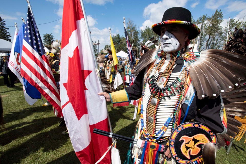 Bredner Lewis from Onion Lake is getting ready for the grand entry at the 50th Annual Powwow at Poundmaker’s Lodge in St. Albert.