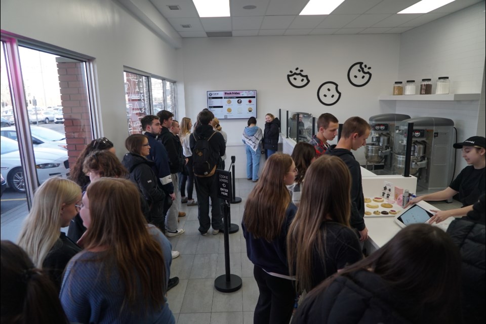 Customers line up for opening day at the St. Albert Crumbl Cookies location on 2 Herbert Rd.. RILEY TJOSVOLD/St. Albert Gazette                 