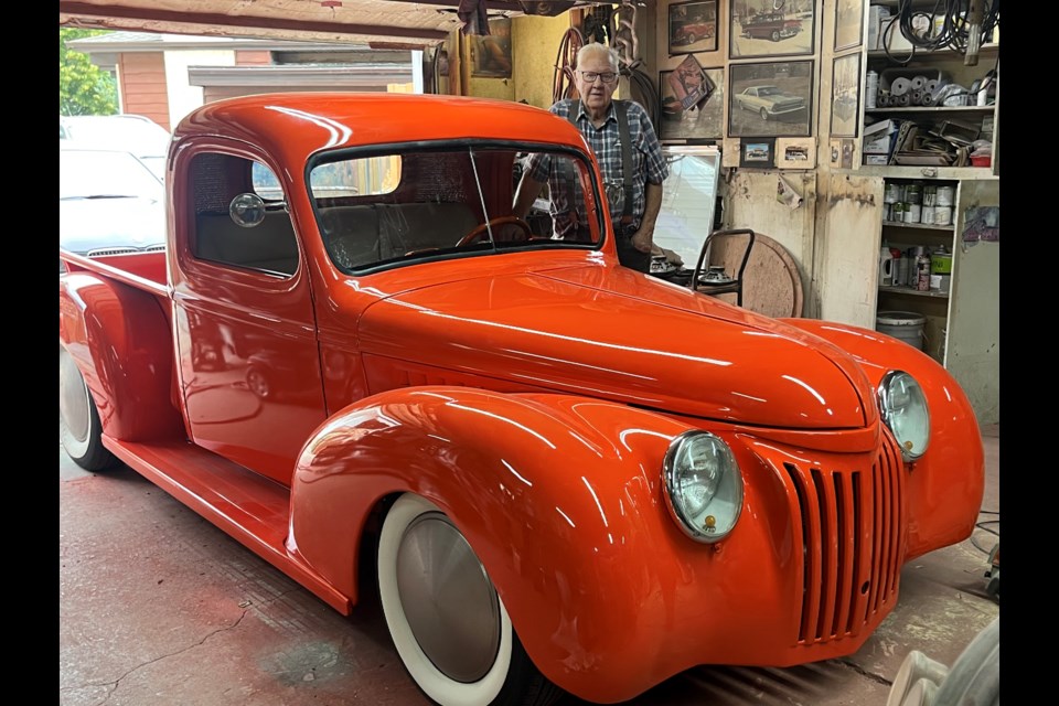 Longtime car enthusiast Gary Poff stands with his custom vintage truck. 