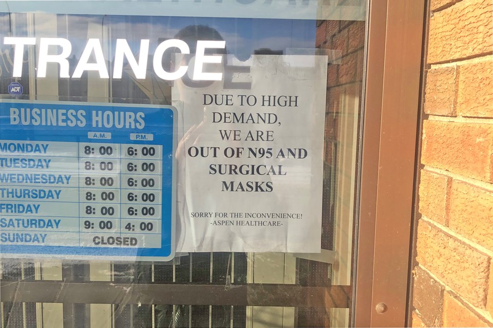 Aspen Healthcare in St. Albert has a notice posted on their door notifying customers they are sold out of N95 respirators. BRITTANY GERVAIS/St. Albert Gazette
