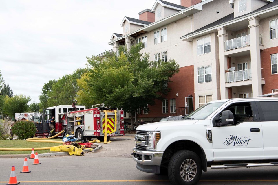 St. Albert and Edmonton fire crews snuffed out a fire on a second-floor balcony at the Sierra's of Inglewood condo complex Sept. 7, 2021. KEVIN MA/St. Albert Gazette