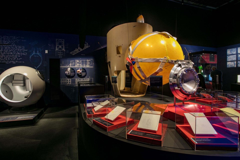 A prototype of DeepSea Challenger is on display at the exhibit, along with James Cameron's original sketches and a pilot sphere to the left. ANDREW FROLOWS/Photo