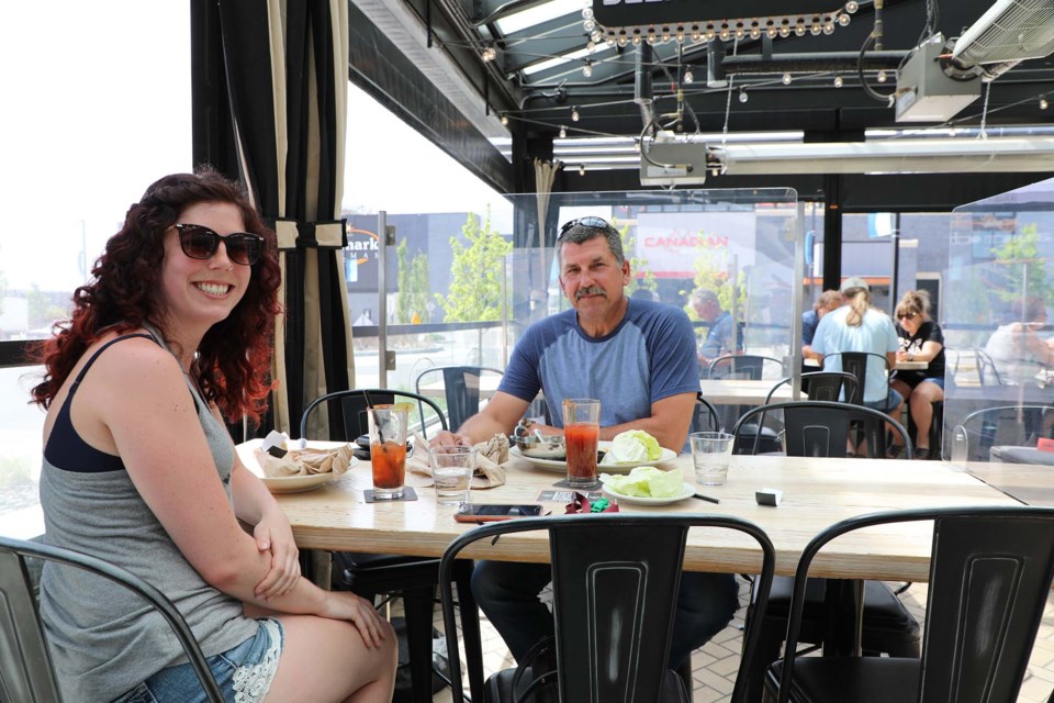 It's a start, says Randy Rozak about the relaunch of patio dining. Rozak enjoyed the afternoon with his daughter Bailey Rozak at Browns Social House on St. Albert Trail on June 3. JESSICA NELSON/St. Albert Gazette