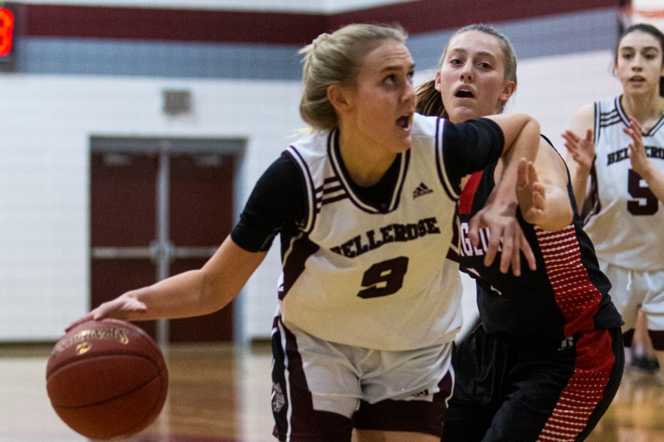 ROCKING THE BALL – Aneilia Ayotte of the Bellerose Bulldogs battles past Sadie Sullivan of the Sturgeon Spirits in the metro Edmonton division two league opener Monday at Bellerose. Ayotte scored a team-high 20 points in the 82-44 win for the 2019 division three champions.
CHRIS COLBOURNE/St. Albert Gazette