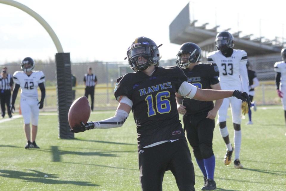 Mason Clayton celebrates after scoring the second of his two touchdowns during the SACHS football team season-opener on Sept. 8, 2022. JACK FARRELL/St. Albert Gazette