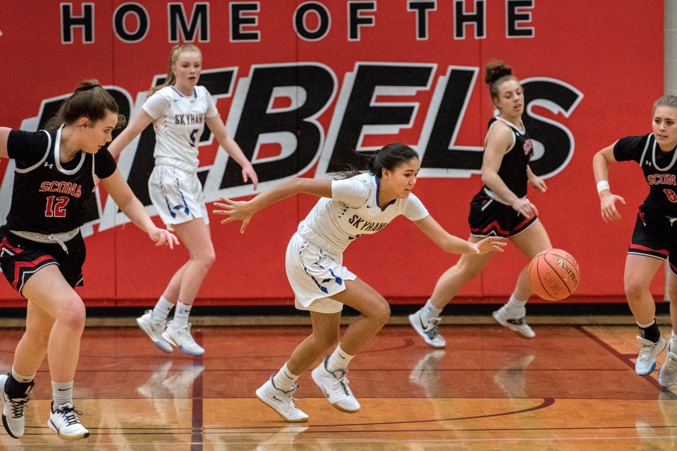 FAST BREAK – Maya Flindall of the St. Albert Skyhawks pushes forward with the ball in Thursday's 96-45 win against the Strathcona Lords at the 38th annual REB Invitational at Jasper Place High School. The 2019 4A provincial champions play today at 2 p.m. in the third-place game or the 6 p.m. final.
DAN RIEDLHUBER/St. Albert Gazette