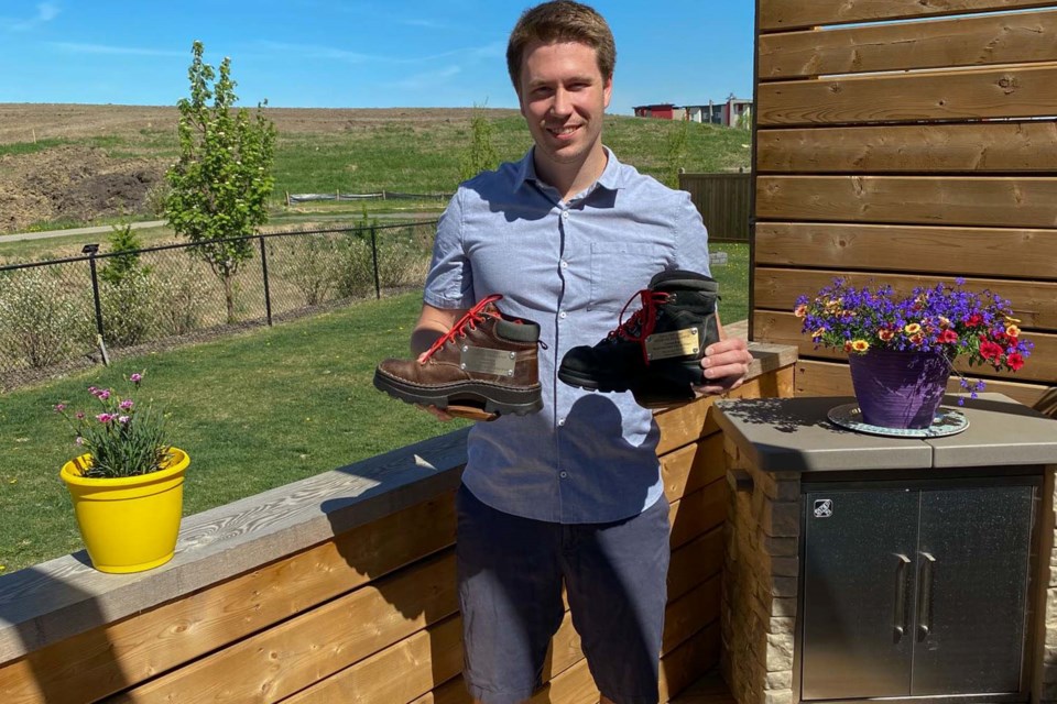 This St. Albert-raised filmmaker is all smiles as he holds up his new boots. The Herzog boots, as they're called, are the awards given out by the Film and Video Arts Society of Alberta (FAVA) during its annual gala. He took home prizes for Smile: It's Only the End of the World and Black and Blue. CHRISTINE KEMP/Photo