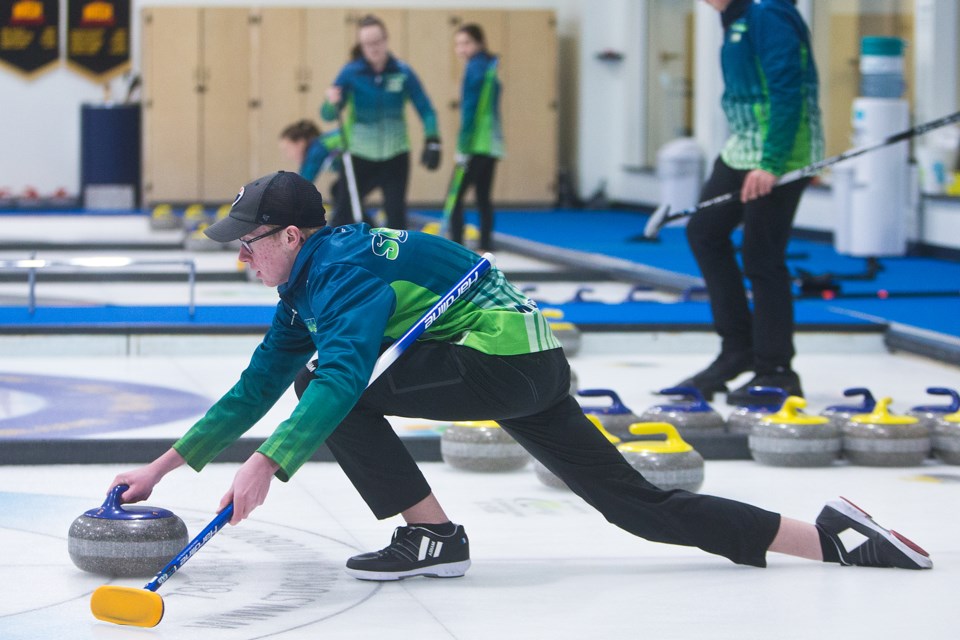 ROCKING IT – Caleb Kerschbaumer of the St. Albert Junior Elite Development (STAJED) program delivers a rock during Tuesday's session at St. Albert Curling Club. This is the third year for the U21 STAJED for Success initiative designed for competitive youth curlers interested in developing their skills and athletic ability.
CHRIS COLBOURNE/St. Albert Gazette