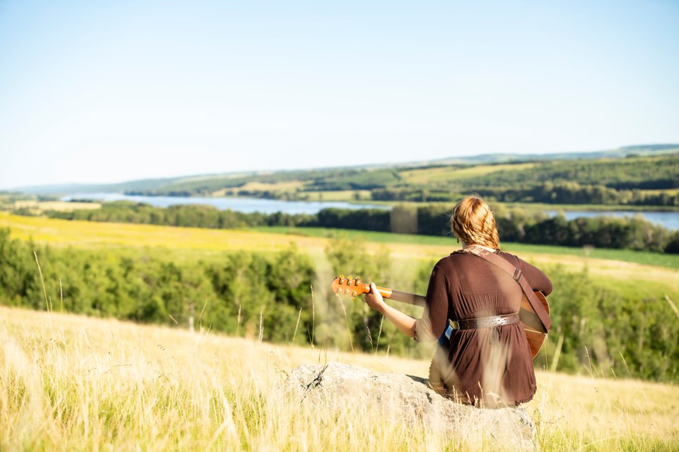 Country singer Caroline Parke, nominated for five International Singer Songwriter Association Awards - sits on her Lloydminster ranch touching the banks of the Saskatchewan River.