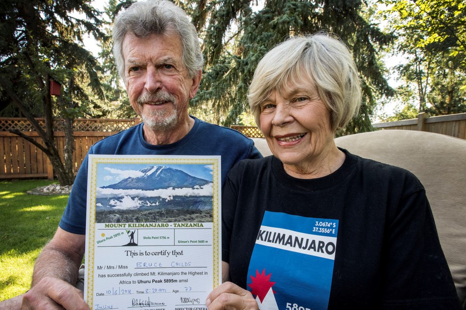 Bruce and Bonnie Childs with proof that they climbed Mount Kilimanjaro at their home in St. Albert September 4, 2019. 