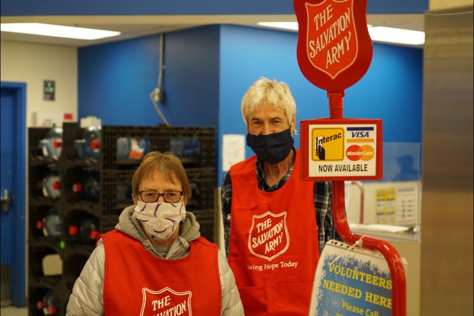 SCOTT HAYES/Photo
Salvation Army volunteers Moureen Clunie and Andre Gravel were already doing a booming business at their Christmas Kettle station at Superstore. The annual campaign, which kicked off last week, has a goal of $400,000.