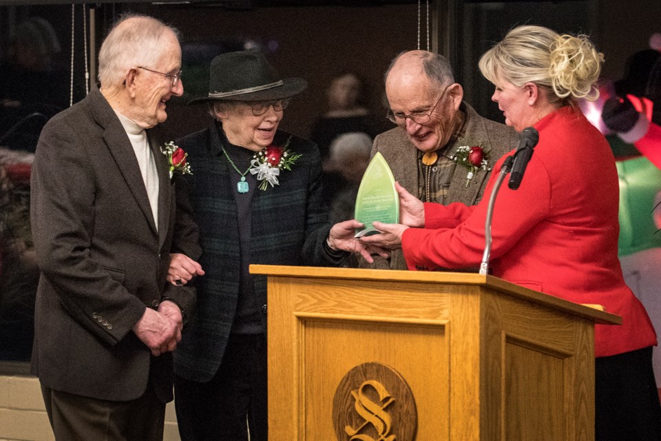 (LtoR) John and Jenny Bocock and Bill Bocock are presented with the Mayor's Award for philanthropy by Mayor Cathy Heron at the Sturgeon Valley Golf Club December 18, 2019.   DAN RIEDLHUBER/St. Albert Gazette