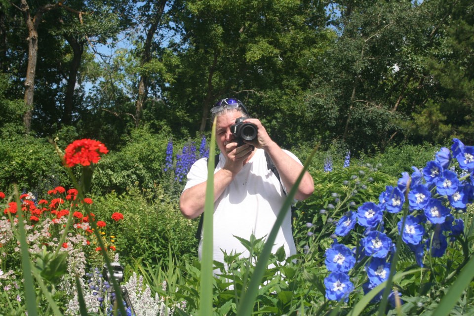 Amateur photographer Mervin Harper views St. Albert Botanic Park through his lens. The professional hairstylist stops by regularly to de-stress and shoot whatever is in bloom. ANNA BOROWIECKI/St. Albert Gazette