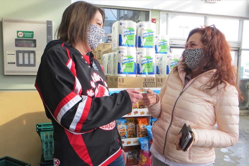 St. Albert Kinette Service and Public Relations Director Tracy Nadiger presented unsuspecting Save-On shopper Leanne Hartle with a $50 gift card on Saturday, Feb. 20 as part of National Kindness Day.