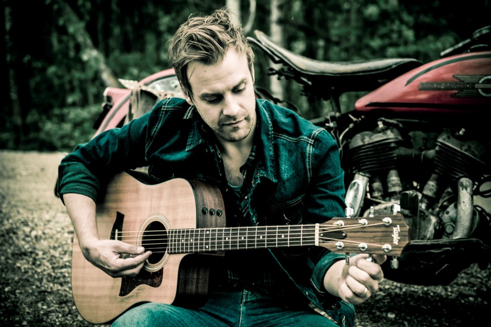 St. Albert country singer-songwriter Dan Davidson is tuning his guitar for a spot on the city's online Canada Day celebrations. MELANIE SWERDEN/Photo