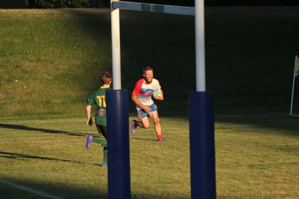 Andrew Marsden heads closer to the posts before touching down for the SARFC senior men's team's final try during the league championship match on Sept. 24, 2022. JACK FARRELL/St. Albert Gazette