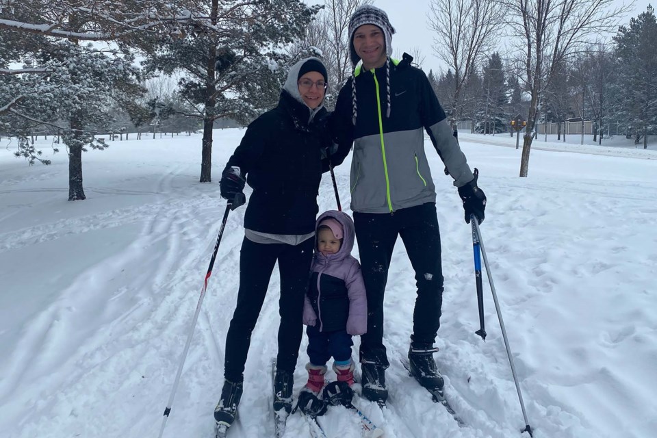 Steven Boyko (right) spends some quality time with his wife Amanda (left) and daughter Carissa (middle) as they enjoy the trails at Kingswood Park on Dec. 22, 2021. PRESTON HODGKINSON/Photo