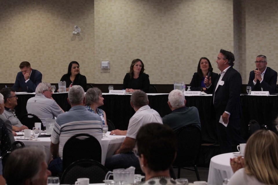 UCP leadership hopefuls Brian Jean (left) Rajan Sawhney, Rebecca Schulz, Danielle Smith, and Travis Toews (right) took part in a meet and greet event moderated by MLA Dale Nally, standing, on Tuesday Aug. 23, 2022. JACK FARRELL/St. Albert Gazette