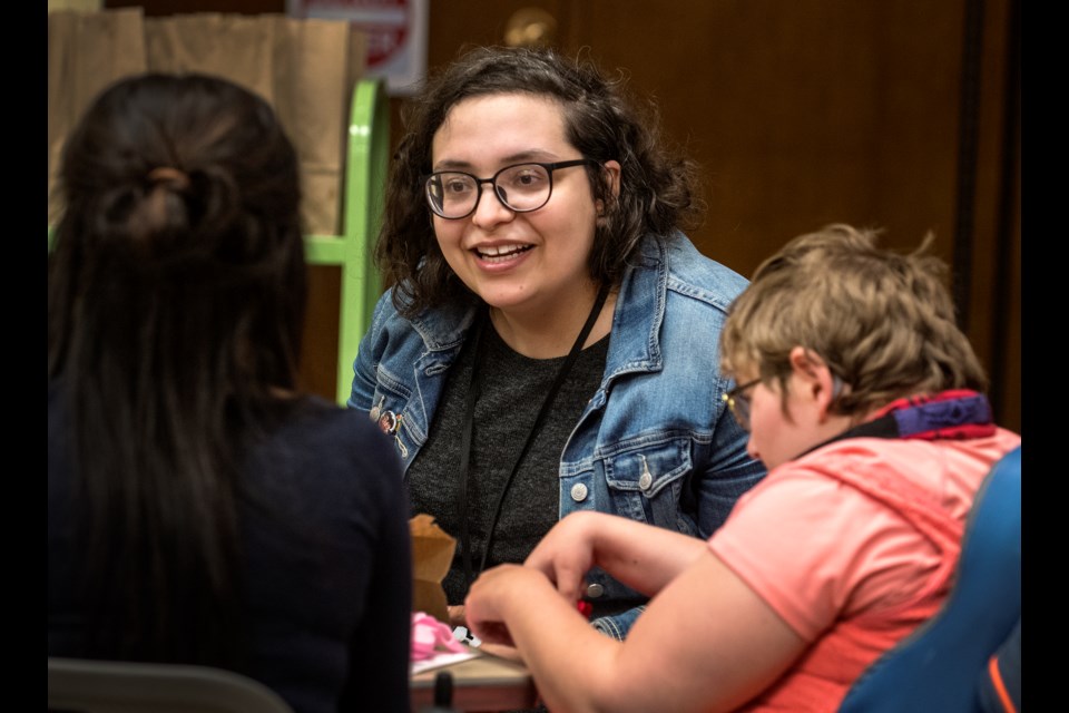 Michele Pagliuso, library support staff, interacts with participants in Forsyth Hall at the library. DAN RIEDLHUBER/St. Albert Gazette