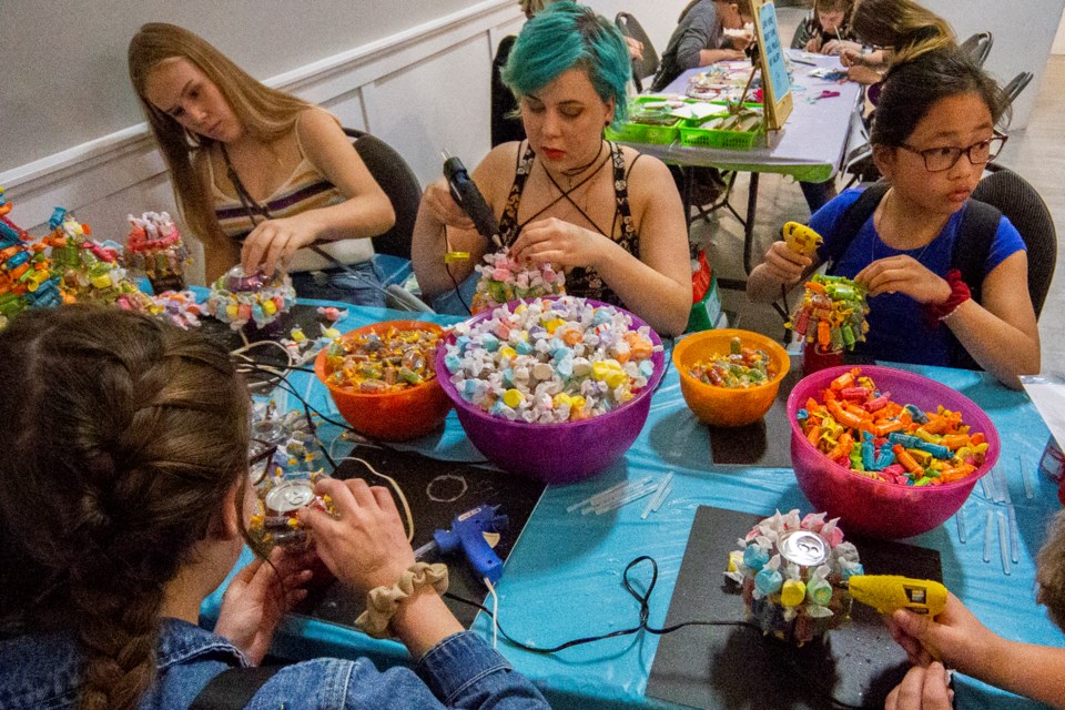 Youth create candy bouquets with a little hot glue and a lot of taffy. 
CHRIS COLBOURNE/St. Albert Gazette