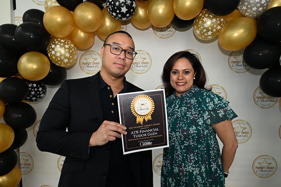 SAINT ALBERT, AB June 22/23: left to right - Andy Lau and Salima Jiwa from ATB Financial pose for a photo out at the Readers choice awards at the St. Albert Gazette parking lot in St. Albert, Alberta Thursday, June 22/23.  (Photo by Walter Tychnowicz/Wiresharp Photography )

