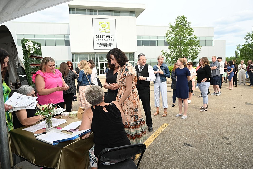 SAINT ALBERT, AB June 22/23:  Guests line up to enter the Readers choice awards at the St. Albert Gazette parking lot in St. Albert, Alberta Thursday, June 22/23.  (Photo by Walter Tychnowicz/Wiresharp Photography )

