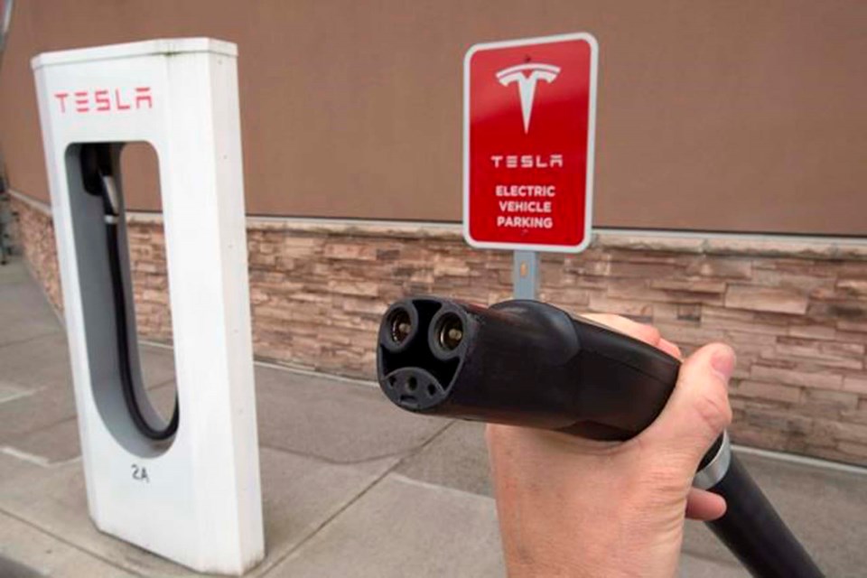 Federal rebate set for electric cars sees 100M go to Tesla buyers