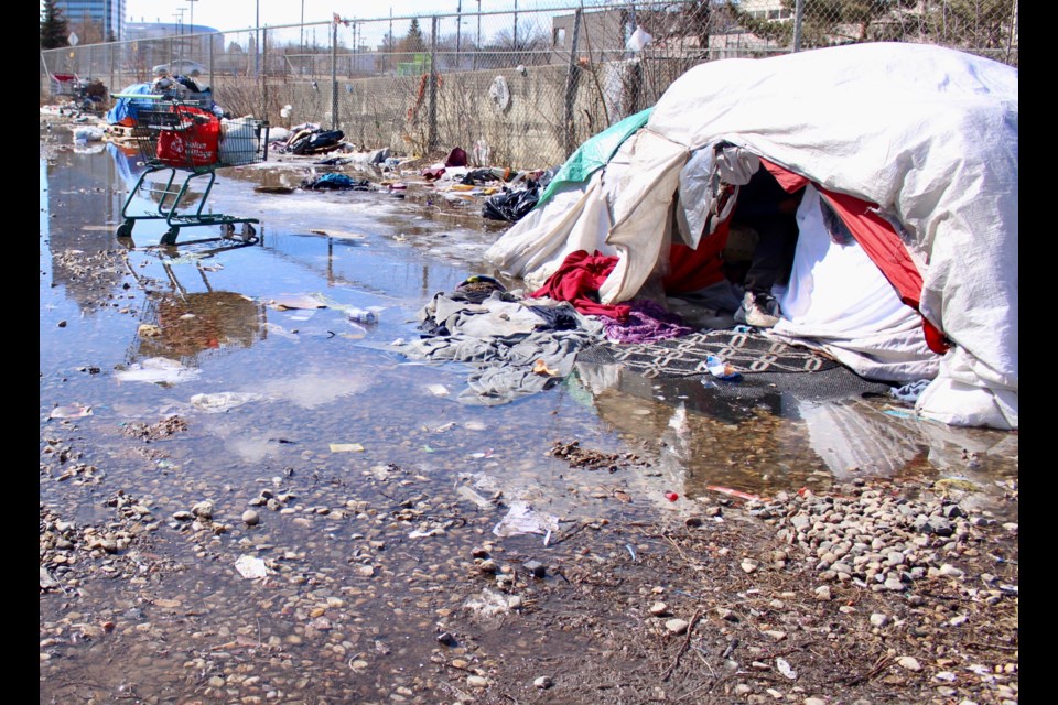 Kevin King and up to 50 other people are living together in tents rather than go to the Edmonton Expo Centre for fear of catching COVID-19. King said they need food, water, bathrooms and garages so they can keep clean and safe during the pandemic. JENNIFER HENDERSON/St. Albert Gazette