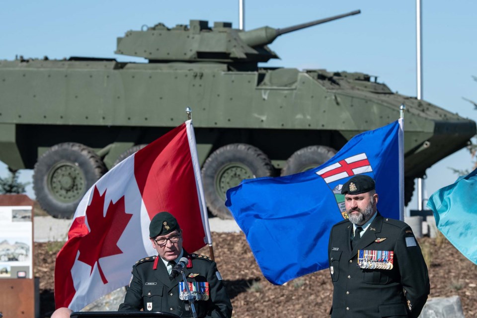 Col. Rob McBride (left) speaks during the unveiling of the LAV lll monument in Morinville on Sunday, Oct 2, 2022. JOHN LUCAS/St. Albert Gazette