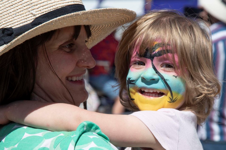 Mabel Bushie, 2, enjoys the Rainmaker midway with her mom Madyson in St. Albert on May 28, 2022. BRUCE EDWARDS/St. Albert Gazette