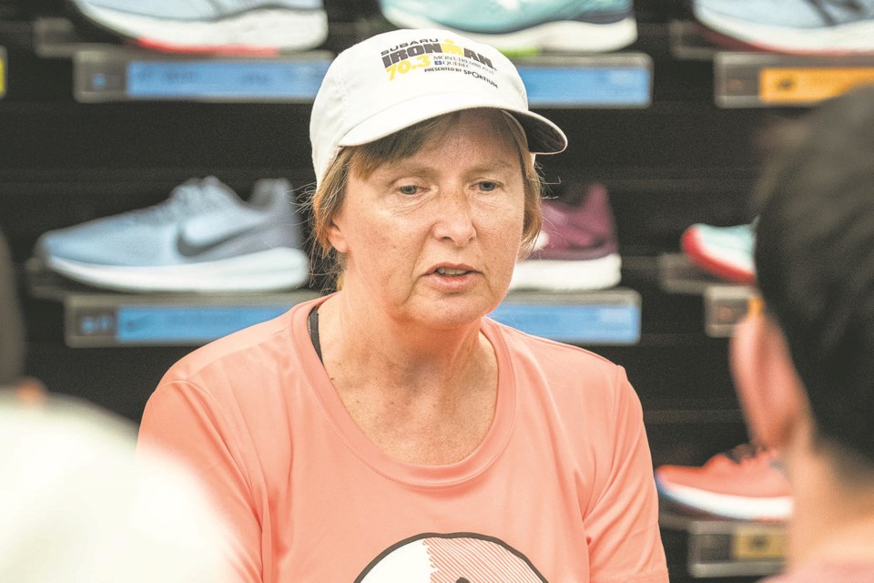 Diane Bergeron,  a blind athlete, speaks to a gathering as guest instructor at the St. Albert Running Room last August. FILE PHOTO/St. Albert Gazette