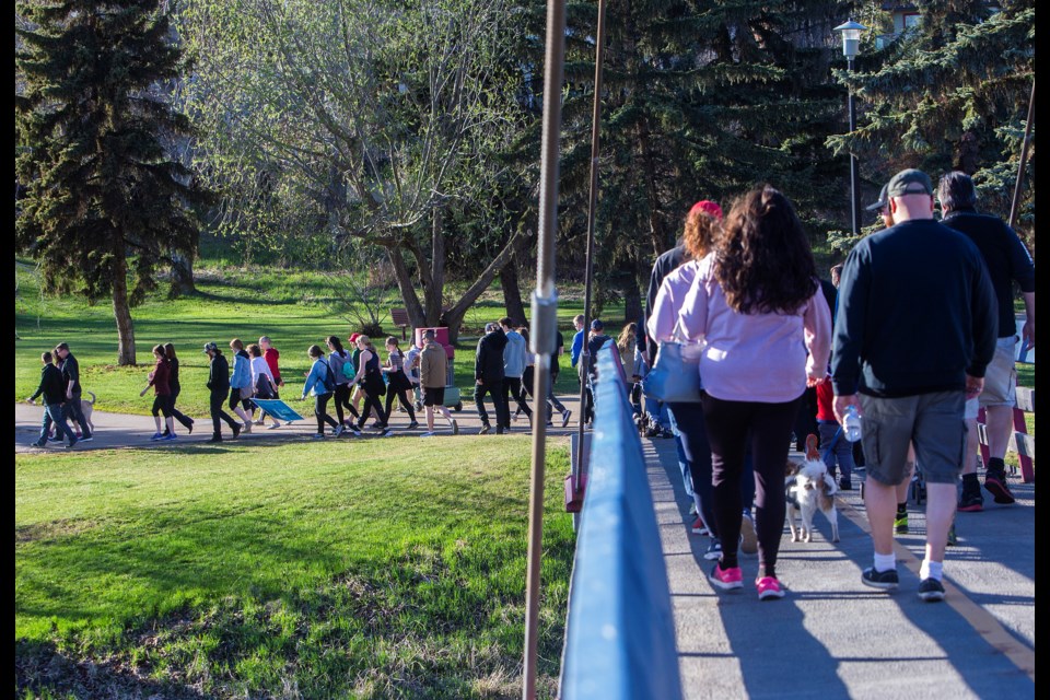 Hundreds of participants hit the trails during the annual Caelin Porter Mental Health Awareness Walk on Friday evening. Proceeds from event will be donated to Mental Health Counselling for Youth in St. Albert. CHRIS COLBOURNE/St. Albert Gazette
