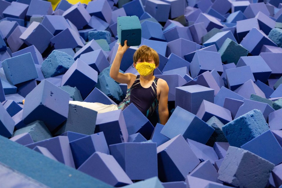 Anderson Barrett is a competitive gymnast, there's no question, but even Olympic athletes know the joy of the foam pit. Barrett was on site at Dynamyx Gymnastics Club on Saturday for the grand opening of the club's grand new facility. DENISE BARRETT/Supplied
