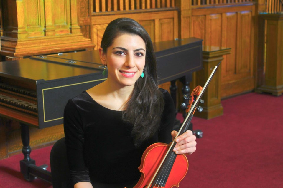 Neda Yamach, both a former St. Albert resident and member of Edmonton Symphony Orchestra, reunites with cellist Ronda Metzies in an  afternoon performance at St. Albert Botanic Park on Sunday, July 24. SUPPLIED/Photo